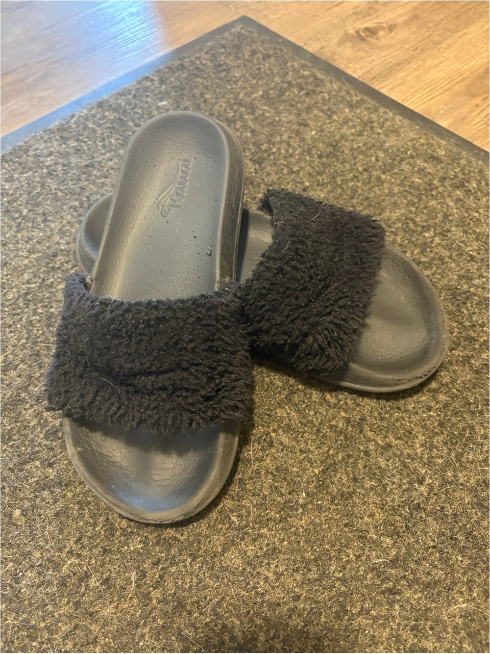 Woman’s Black Fuzzy Slide Sandals